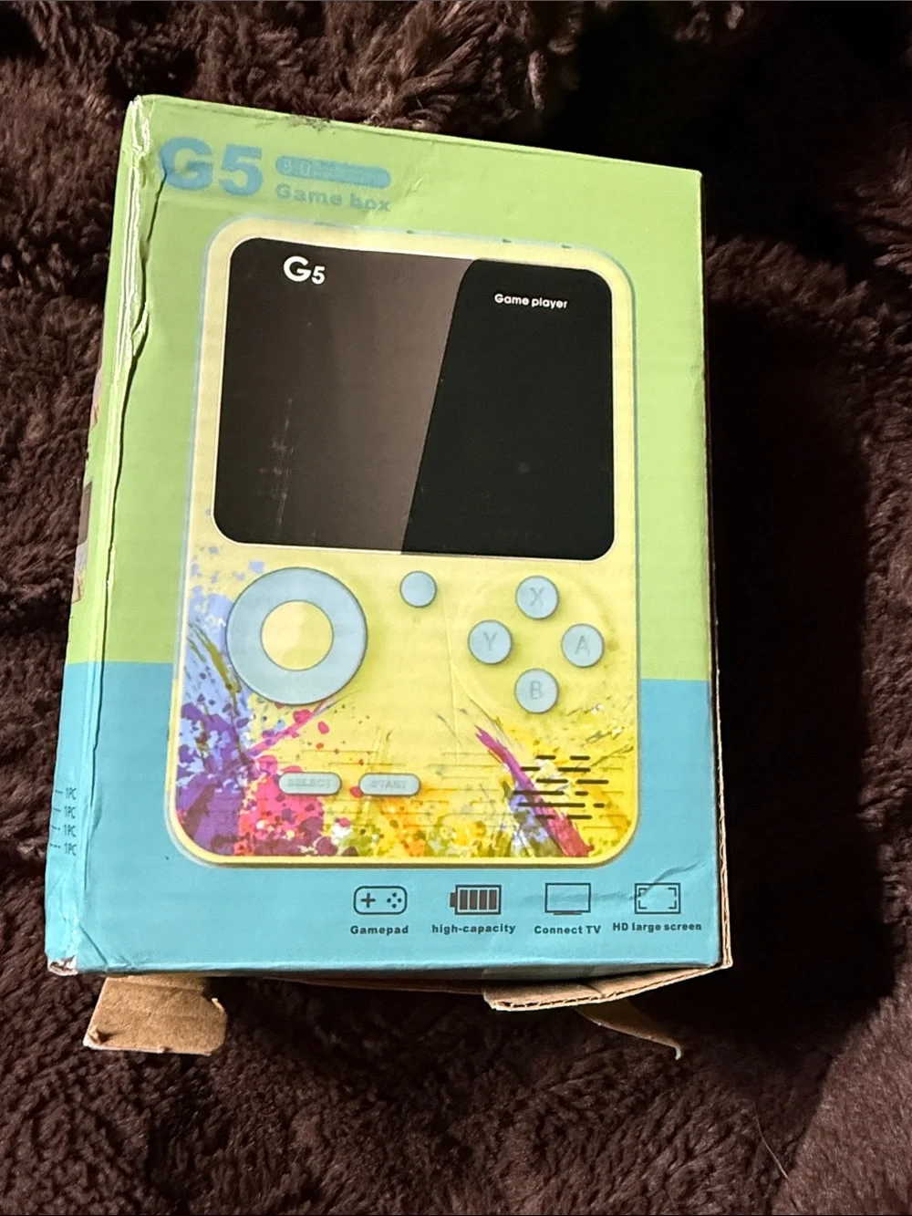 Portable Handheld Game Console in Pink with Blue Controls